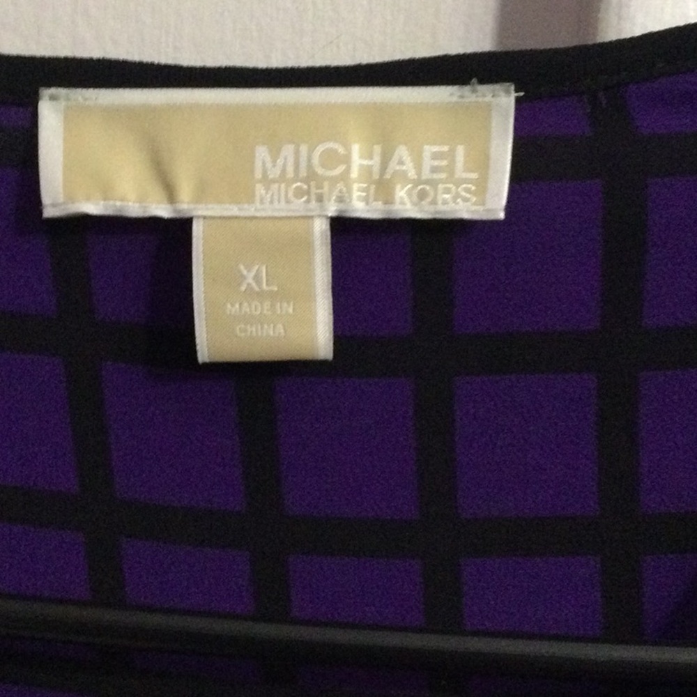 Michael Kore - Picture 2 of 3
